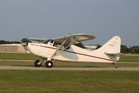 N6909M @ KOSH - Stinson 108-1 - by Mark Pasqualino