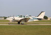 N99MQ @ KOSH - Beech D55 - by Mark Pasqualino