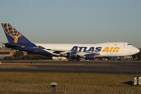 N409MC @ YSSY - taxiing - by Bill Mallinson
