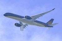 VN-A889 @ RJTT - Exiting the clouds - by JPC