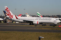 VH-YFG @ YSSY - taxi from 3-4L - by Bill Mallinson