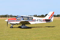 G-FTIL - Just landed at, Bury St Edmunds, Rougham Airfield, UK. Currently without nose wheel spat.
