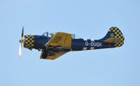 G-OUGH @ EGFH - Resident Yakovlev Yak-52 low over Runway 22. - by Roger Winser