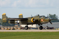 N345BG @ KOSH - Departing from runway 18R. - by George Pergaminelis