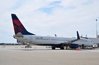 N816DN @ KBOI - Parked at the gate.