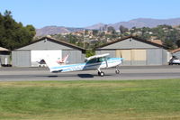 N704JH @ SZP - 1976 Cessna 150M, Continental O-200 100 Hp, liftoff roll Rwy 04 - by Doug Robertson
