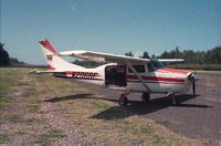 N206AE @ PHDH - N206AE at Dillingham Airfield on Oahu, Hawaii. Used for skydiving operations. Taken probably in Spring of 1990. - by Christopher B.