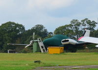G-IPEP @ EGTR - 1979 Beech Baron parked and covered at Elstree but a prop removed not looking quite so spruce now - by Chris Holtby