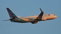 PK-GNG @ YPPH - Boeing 737-8U3. Garuda Indonesia PK-GNG departed rwy 21 in light of the setting Sun, YPPH 280919.