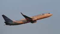 PK-GNG @ YPPH - Boeing 737-8U3. Garuda Indonesia PK-GNG, departed rwy 21, in the light of the setting Sun, YPPH 280919.