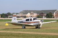 N7029V @ KOSH - Mooney M20F - by Mark Pasqualino