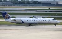 N405AW @ KORD - CL-600-2B19 - by Mark Pasqualino