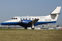 VH-OTQ @ YSSY - taxi to 34R - by Bill Mallinson