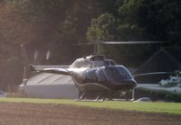 G-OETI @ EGSG - Jet Ranger landing at Stapleford Tawney, Essex - by Chris Holtby