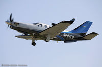 N694PB @ KOSH - Socata TBM-700  C/N 1043, N694PB