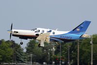 N329FD @ KOSH - Socata TBM-700  C/N 1150, N329FD - by Dariusz Jezewski www.FotoDj.com