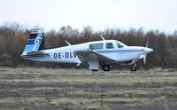 OE-DLV @ EGFH - Resident Mooney M20J. - by Roger Winser