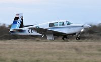 OE-DLV @ EGFH - Resident Mooney M20J departing Runway 04 at dusk. - by Roger Winser