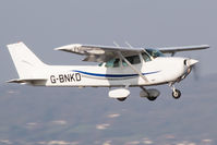 G-BNKD @ EGGD - Landing RWY 09 - by Dominic Hall
