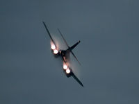 86-0126 @ KOSH - Low res – hard to catch after dark - Rear view of USAF B-1B AF 86-0126 Cn 86 departing after a Dusk ‘ Afterburner Vapour Run’, with wings partly swept rearward. Photo taken at 1931 hrs at the start of the Night Airshow, at Air Venture Oshkosh on 26Jul2017 - by Walnaus47