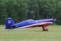 F-TGCJ @ LFFQ - Extra 330SC, French Air Force aerobatic team, Taxiing to parking area, La Ferté-Alais (LFFQ) air show 2016 - by Yves-Q