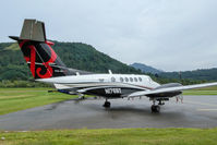 N176BY @ LSZA - A rainy day at Lugano-Agno - by sparrow9