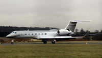 N533GV @ EGGW - Landing LTN - by Michael Vickers
