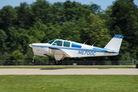 N670DC @ OSH - Beech 35 Debonair - by Graham Dash