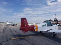 N39016 @ KPNE - Redtail on the former Hortman ramp, KPNE. - by Joy Kazimer