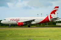 C-FYJH @ TFFR - Air Canada Rouge Airbus A319-113 backtracking on runway 12 at Pointe-à-Pitre airport - by atc.gp
