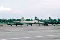 FM-1134 @ WMKB - Canadair CL-41G Rmaf FM-1134 in the company of a newly delivered F-5E and a CAC Sabre. RAAF Base Butterworth August 1975. - by kurtfinger
