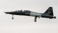 65-10332 @ KNFW - On final for landing, gear down with both seats occupied.