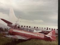 N6442D @ MIA - Photo taken at Corrosion Corner at MIA in 1974 - by Grey Wolf