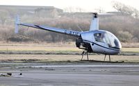 G-BYIE @ EGFH - Resident R-22 Beta operated by HeliAir Wales. - by Roger Winser