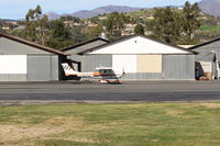 N8404M @ SZP - 1969 Cessna A150K AEROBAT, Lycoming O-320-E2D upgrade, taxi - by Doug Robertson