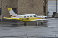 N4427N @ KTRI - Running up the engine in preparation for departure from a rainy, wet Tri-Cities Airport (KTRI).