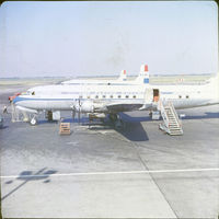 PH-TGA @ EHAM - Plane DC6b, registration PH-TGA The plane was named Dr Ir M.R Damme. This photo was taken late 1959. Most likely prior for departure to Tehran. - by J.W.A Schwartz (1959)