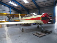 G-CDJJ @ EGTN - Pristine Yak 52 hangared at Enstone Airfield, Oxon. Owned by a Bicester company Digitakumi Ltd. - by Chris Holtby