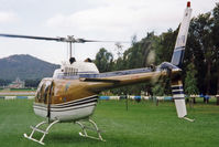 VH-EPQ - Rear Port side view of Private Bell 206B JetRanger II VH-EPQ Cn 219 (with rotors turning) on a temporary grass helipad near Old Parliament House, Canberra, during Canberra Week festivities on 17Mar1997. Mt Ainslie and the AWM are visible at left. - by Walnaus47