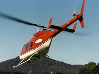 VH-SBC - Rear Port side view of Bell 206L-3 LongRanger III VH-SBC Cn 51396 departing towards Lake Burley Griffin Canberra during Canberra Week festivities on 17Mar1997-Canberra Day. Mt Ainslie is at rear. Several Bell JetRangers flew many 5 min joyflights that day - by Walnaus47