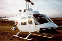 VH-FJR (1) @ YSCN - Close cropped front Stbd view of Bell Helicopter Australia white-skin Demonstrator Bell 206A VH-FJR Cn 168. Photo taken just before sunset at Camden Airport, YSCN, on 20Aug1970. The helo was fitted with a Nite-Sun searchlight, which was demonstrated then.