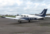 G-KIKI @ EGTR - Parked outside with many other Elstree resident light aircraft - by Chris Holtby