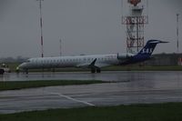 ES-ACG @ EGSH - emerging at Norwich in the new SAS livery - by AirbusA320