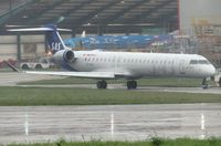 ES-ACG @ EGSH - Dvalin Viking under tow from Air Livery following respray. This is the first CRJ to be painted in the new SAS livery.