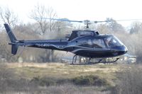 G-EJOC @ EGFH - Resident Ecureuil helicopter. - by Roger Winser