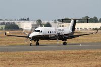 F-GLNK @ LFBD - Beech 1900D, Taxiing to holding point Delta rwy 05, Bordeaux Mérignac airport (LFBD-BOD) - by Yves-Q