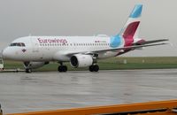D-AKNQ @ EGSH - Under tow by Air Livery to Stand 5, following respray.