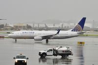 N14228 @ SFO - Rainy morning SFO 2020. - by Clayton Eddy