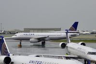 N437UA @ KSFO - Rainy morning SFO 2020. - by Clayton Eddy