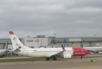 SE-RRA @ EGKK - Taxiing at Gatwick, London - by Chris Holtby